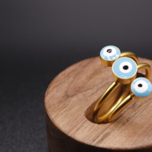 Anillo baño de oro triple ojo turco