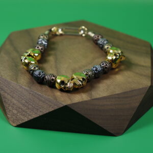 Pulsera Calaveras Doradas